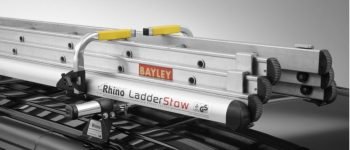 Rhino Ladder Stow locking down a ladder on roof of van